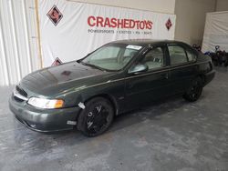 Carros salvage sin ofertas aún a la venta en subasta: 2001 Nissan Altima XE