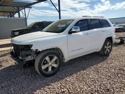 Salvage SUVs for sale at auction: 2014 Jeep Grand Cherokee Overland