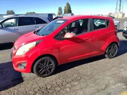 Salvage cars for sale from Copart Hayward, CA: 2013 Chevrolet Spark 1LT