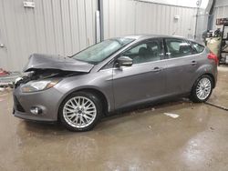 Salvage cars for sale at Casper, WY auction: 2014 Ford Focus Titanium