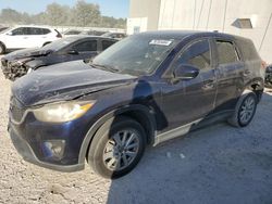 Salvage cars for sale at Apopka, FL auction: 2013 Mazda CX-5 Touring