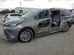 Salvage cars for sale at Riverview, FL auction: 2021 Toyota Sienna XLE