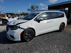 Chrysler Pacifica Hybrid Touring l salvage cars for sale: 2023 Chrysler Pacifica Hybrid Touring L