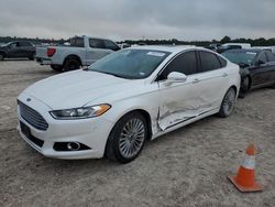 Salvage cars for sale at Houston, TX auction: 2014 Ford Fusion Titanium HEV