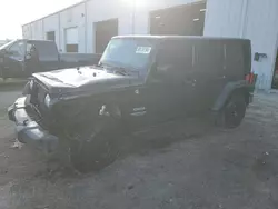 Salvage cars for sale at Jacksonville, FL auction: 2017 Jeep Wrangler Unlimited Sport