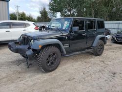 Salvage cars for sale from Copart Midway, FL: 2012 Jeep Wrangler Unlimited Sport