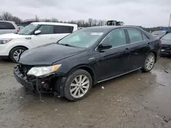 Lots with Bids for sale at auction: 2013 Toyota Camry Hybrid