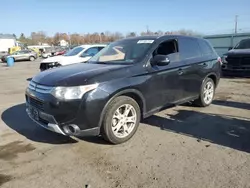 Mitsubishi salvage cars for sale: 2015 Mitsubishi Outlander SE