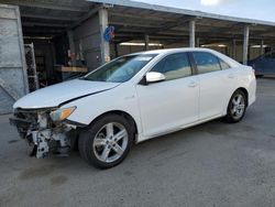 Salvage cars for sale at Fresno, CA auction: 2012 Toyota Camry Hybrid