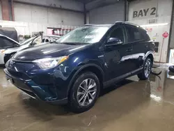 Salvage cars for sale at Elgin, IL auction: 2018 Toyota Rav4 HV LE