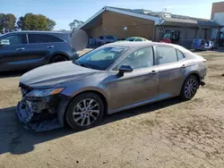 Salvage cars for sale at Hayward, CA auction: 2021 Toyota Camry LE