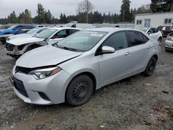 Salvage cars for sale from Copart Graham, WA: 2015 Toyota Corolla L