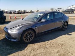 Salvage cars for sale at auction: 2022 Tesla Model 3