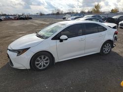 Salvage cars for sale at London, ON auction: 2021 Toyota Corolla LE