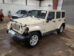 2012 Jeep Wrangler Unlimited Sahara en venta en Lansing, MI