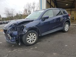 Salvage SUVs for sale at auction: 2014 Mazda CX-5 Touring