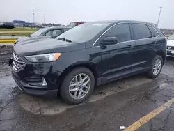 Salvage cars for sale at Woodhaven, MI auction: 2022 Ford Edge SEL