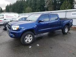 Salvage cars for sale at Arlington, WA auction: 2015 Toyota Tacoma Double Cab Long BED