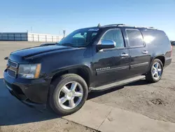 Salvage cars for sale at Fresno, CA auction: 2011 Chevrolet Suburban C1500 LT