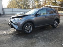 Salvage cars for sale from Copart Austell, GA: 2018 Toyota Rav4 HV LE