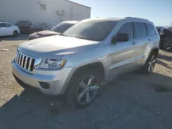 SUV salvage a la venta en subasta: 2011 Jeep Grand Cherokee Laredo