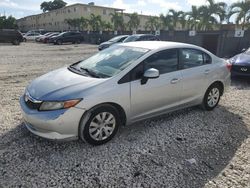 Salvage cars for sale from Copart Opa Locka, FL: 2012 Honda Civic LX