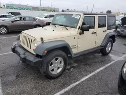 Salvage cars for sale from Copart Van Nuys, CA: 2011 Jeep Wrangler Unlimited Sport