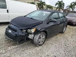 Salvage cars for sale at Opa Locka, FL auction: 2014 Chevrolet Sonic LT