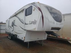 Salvage trucks for sale at Mocksville, NC auction: 2013 Laredo Camper