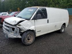 Salvage trucks for sale at Graham, WA auction: 2002 Chevrolet Express G2500