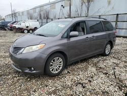 Salvage cars for sale at auction: 2011 Toyota Sienna XLE