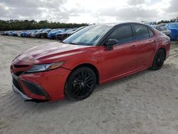 Salvage cars for sale at Fort Pierce, FL auction: 2022 Toyota Camry XSE