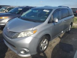 Flood-damaged cars for sale at auction: 2014 Toyota Sienna LE