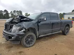 Salvage SUVs for sale at auction: 2018 Nissan Titan XD SL