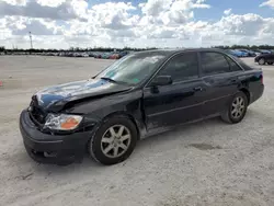 Salvage cars for sale from Copart Arcadia, FL: 2003 Toyota Avalon XL