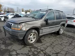 Salvage cars for sale from Copart Portland, OR: 1999 Jeep Grand Cherokee Laredo