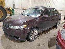 Salvage cars for sale from Copart Rocky View County, AB: 2011 KIA Forte SX