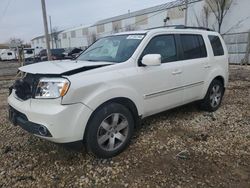 Carros salvage sin ofertas aún a la venta en subasta: 2014 Honda Pilot Touring