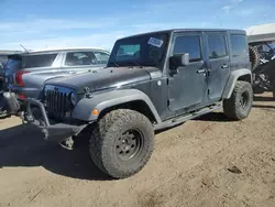 Salvage cars for sale from Copart Brighton, CO: 2012 Jeep Wrangler Unlimited Sport