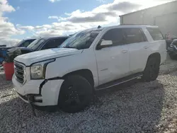 Salvage SUVs for sale at auction: 2015 GMC Yukon SLT