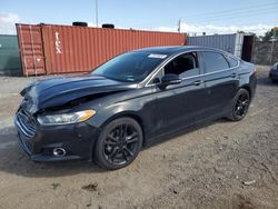 Salvage cars for sale at Homestead, FL auction: 2014 Ford Fusion Titanium