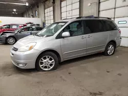 Salvage cars for sale at Blaine, MN auction: 2004 Toyota Sienna XLE