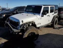 Salvage SUVs for sale at auction: 2015 Jeep Wrangler Unlimited Sport