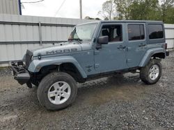 Jeep salvage cars for sale: 2014 Jeep Wrangler Unlimited Sahara