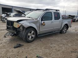 Salvage cars for sale from Copart Haslet, TX: 2005 Nissan Frontier Crew Cab LE