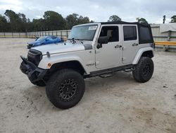 Salvage cars for sale at Fort Pierce, FL auction: 2010 Jeep Wrangler Unlimited Sahara