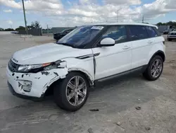 Salvage cars for sale at Homestead, FL auction: 2015 Land Rover Range Rover Evoque Pure Plus