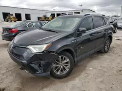 Salvage cars for sale from Copart Riverview, FL: 2016 Toyota Rav4 HV XLE