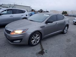 Salvage cars for sale at auction: 2013 KIA Optima EX