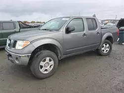 Salvage cars for sale from Copart Eugene, OR: 2006 Nissan Frontier Crew Cab LE